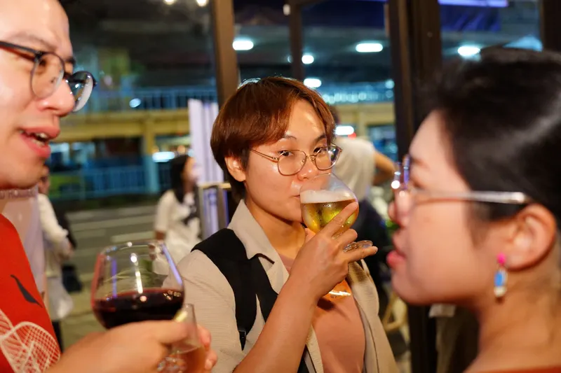 Three guests share drinks and conversation at the first Taiwan Digital Night