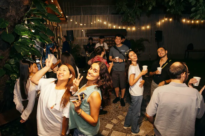 Local and international guests dance together to the live music